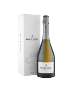 A bottle of Wild Idol Alcohol Free Sparkling White Wine next to its box