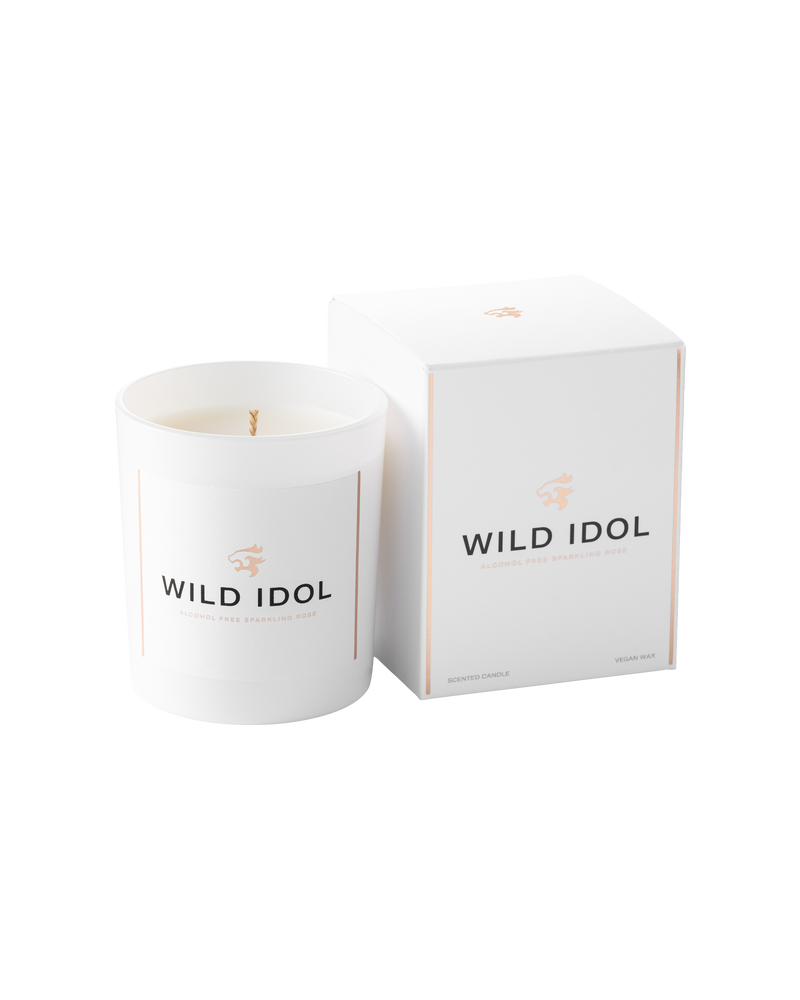 WILD IDOL Rosé Candle next to its box