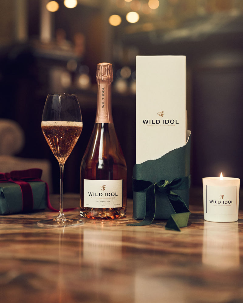 WILD IDOL Alcohol Free Sparkling Rosé Wine and exclusive candle.