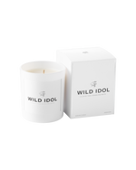 WILD IDOL White Candle next to its box