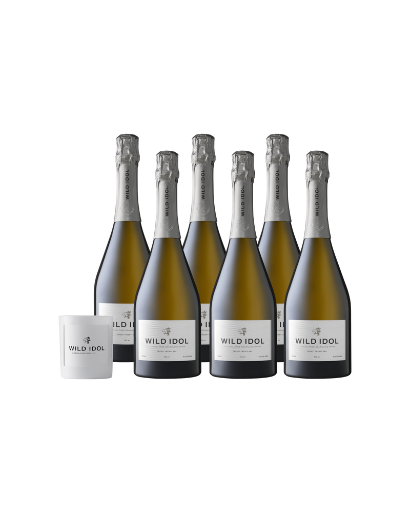 Six bottles of WILD IDOL Alcohol Free Sparkling White Wine, and a complimentary white candle