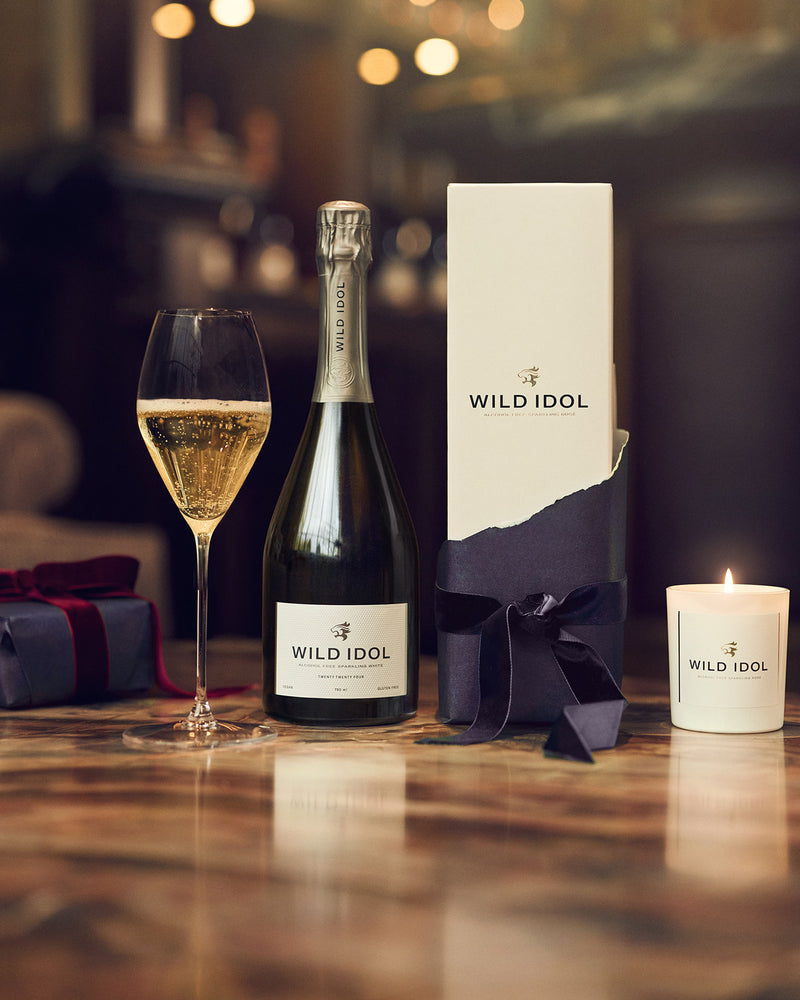 WILD IDOL Alcohol Free Sparkling White Wine and exclusive candle.