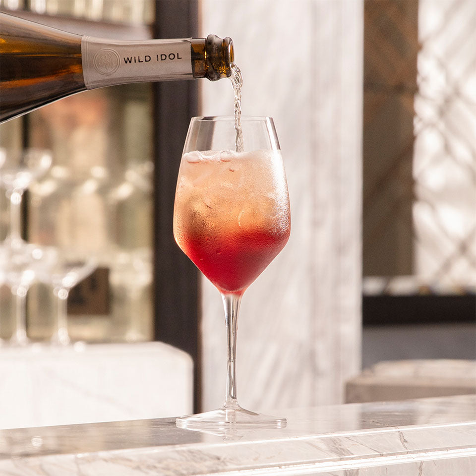 Winter Berry Spritz cocktail, made with Wild Idol alcohol free sparkling Rosé wine