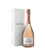 A bottle of Wild Idol Alcohol Free Sparkling Rosé Wine next to its box
